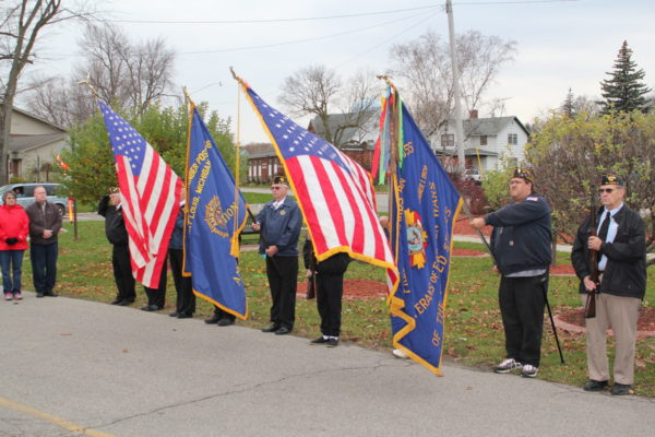 Veterans holding Michigan & U.S. Flags