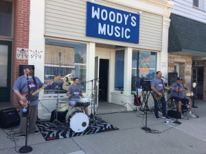 Storefront of Woody's Music