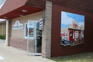 Jim's Barber Shop with mural