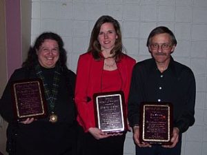 A photograph of the winners of the local person of the year awards, including Jan Caputo and Joe Scholtz.