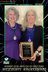2023 Spirit of St. Louis recipient Mari Anne Ryder receives her award from 2021 Spirit of St. Louis recipient Linda Bader.